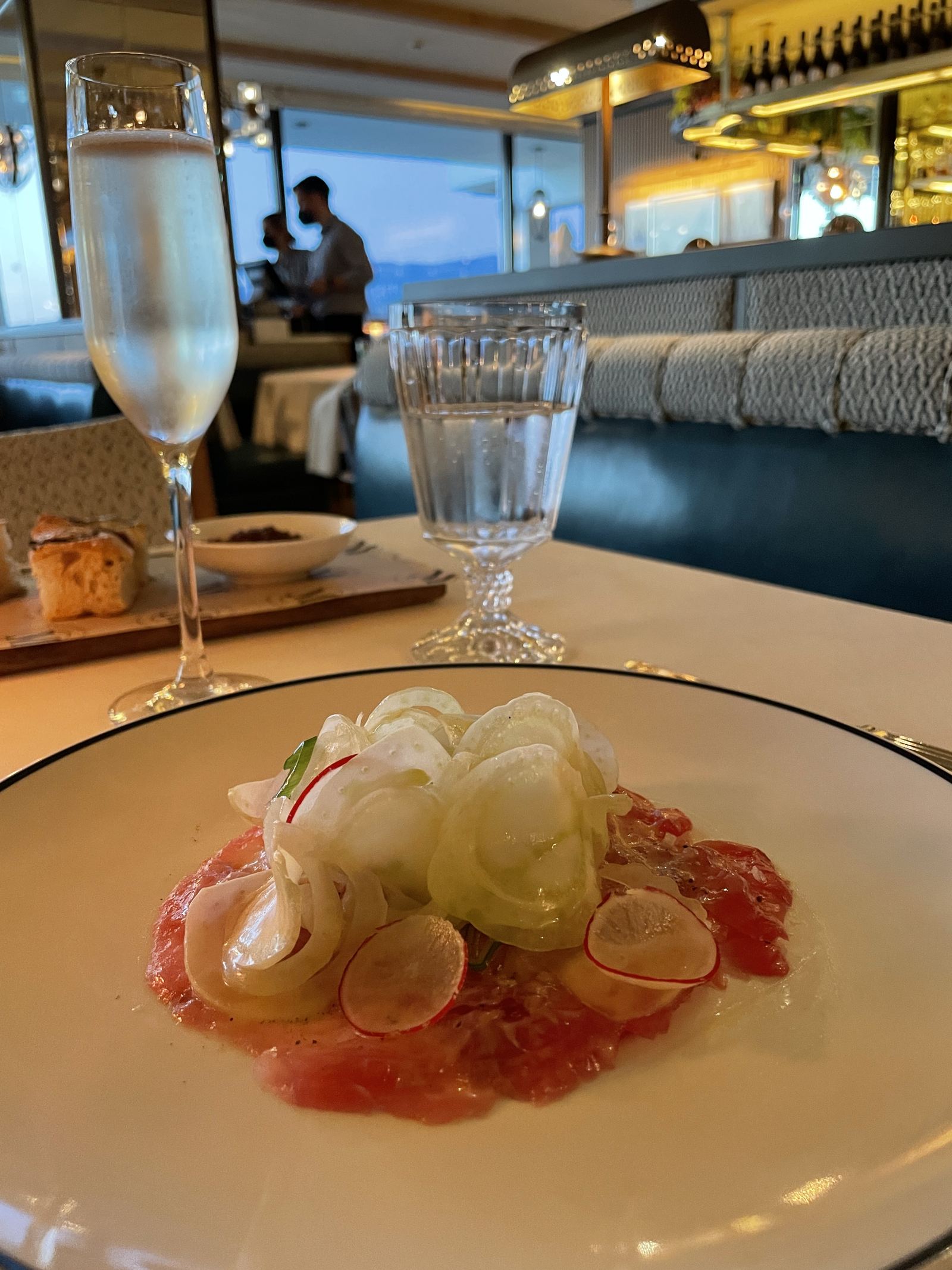 A fish carpaccio with shaved fennel and radish at Mercato