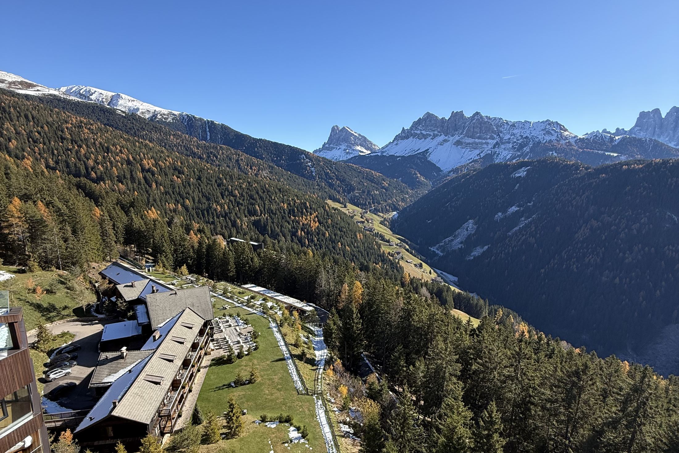 FORESTIS seen from above, the towers and the pool against the slopes of the Plose