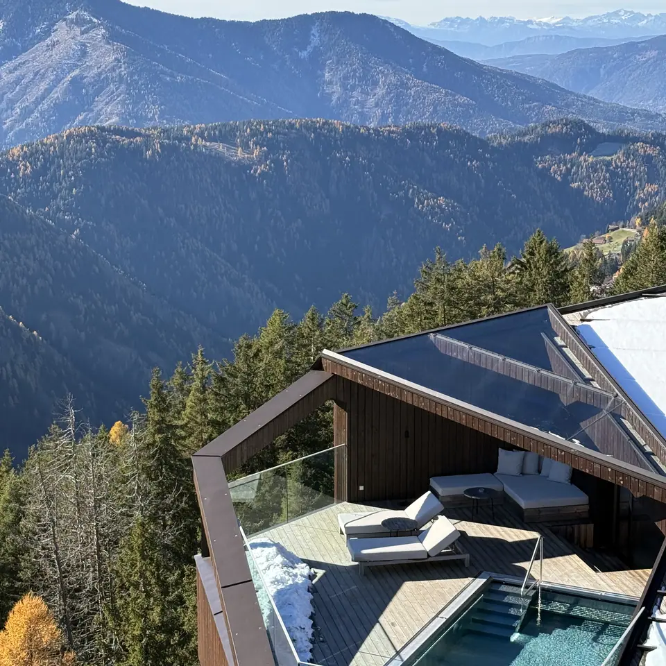 The rooftop terrace and pool of a tower suite at FORESTIS, seen from above