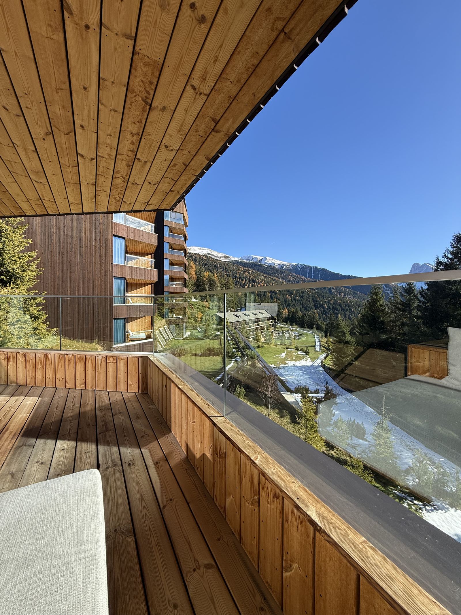 The terrace of a Tower Suite with the mountains beyond the balustrade
