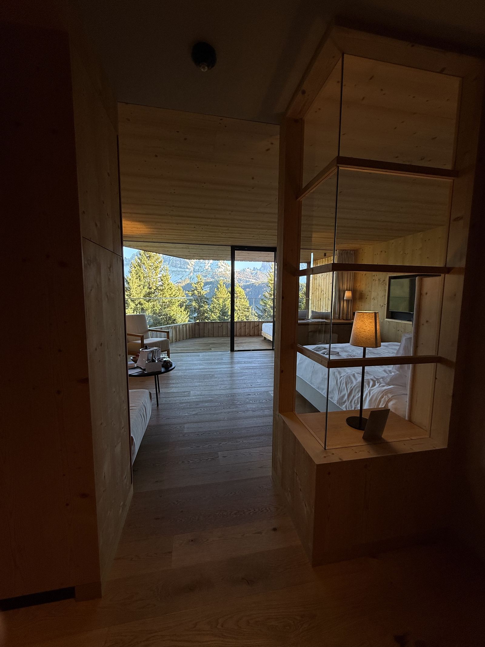 The interior of a Tower Suite at FORESTIS looking through to the terrace