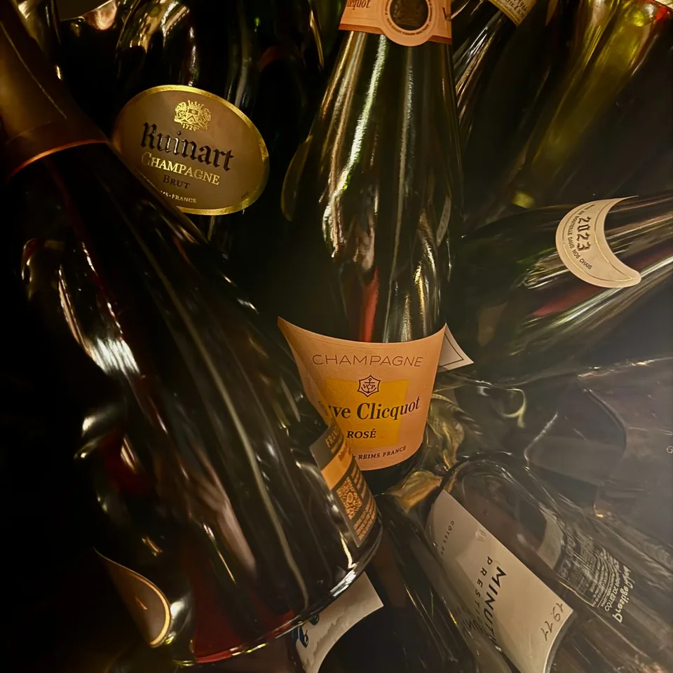 Champagne bottles standing in ice