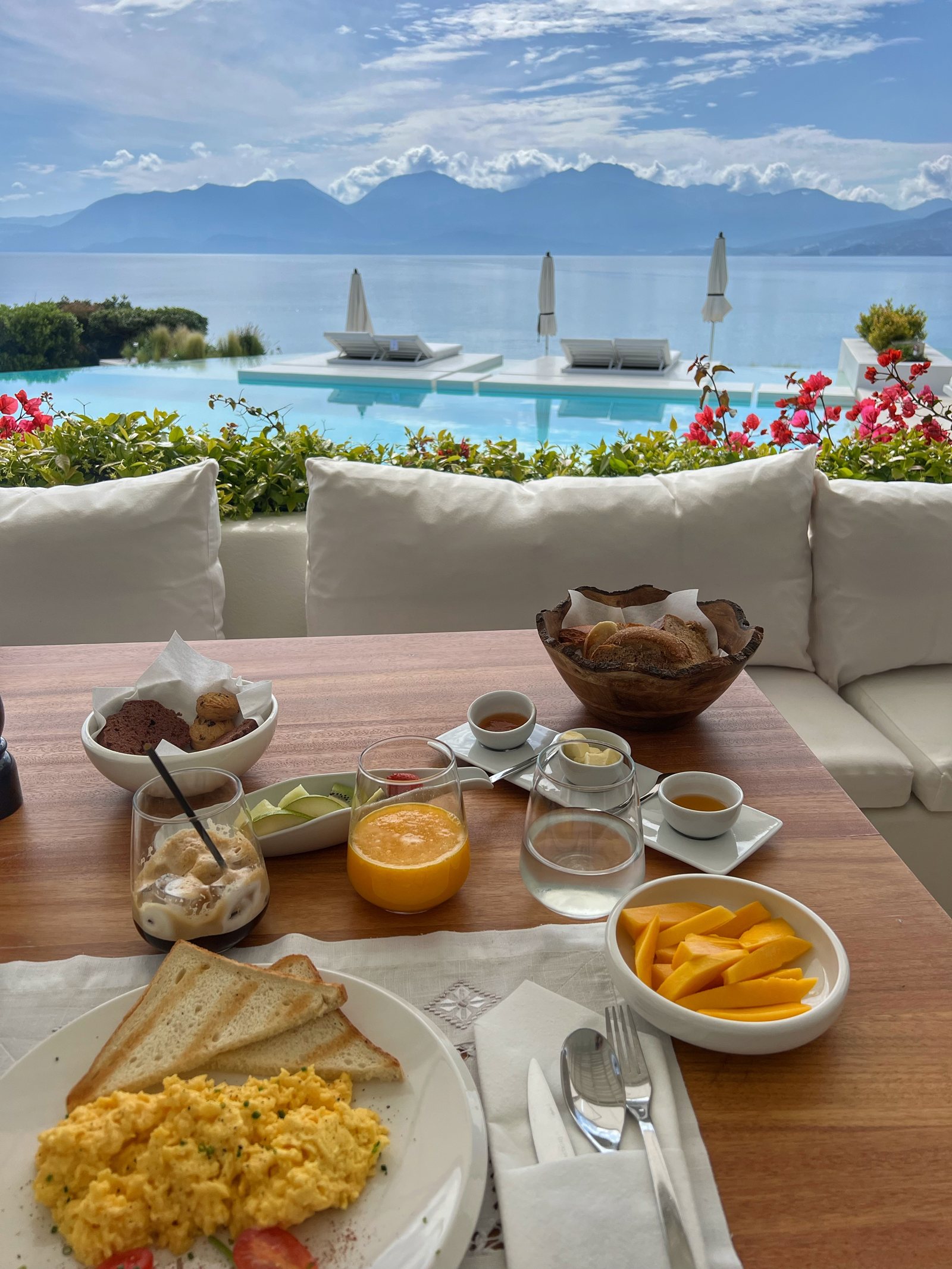 Breakfast laid on a table above the bay